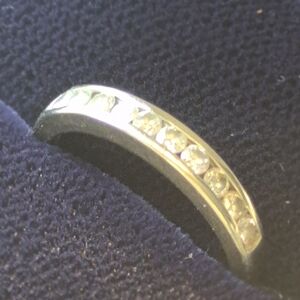 14kt White Gold Band Ft. Channel Set Of 10 Diamonds